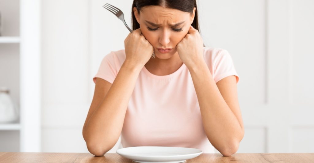 Empty plate, no eating