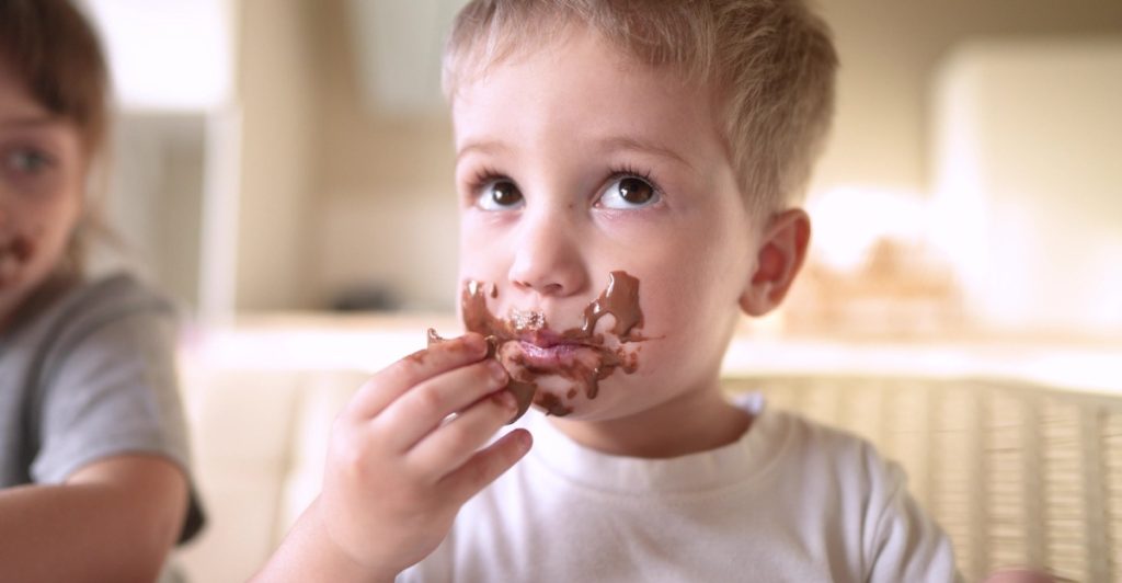 Kid eating candy