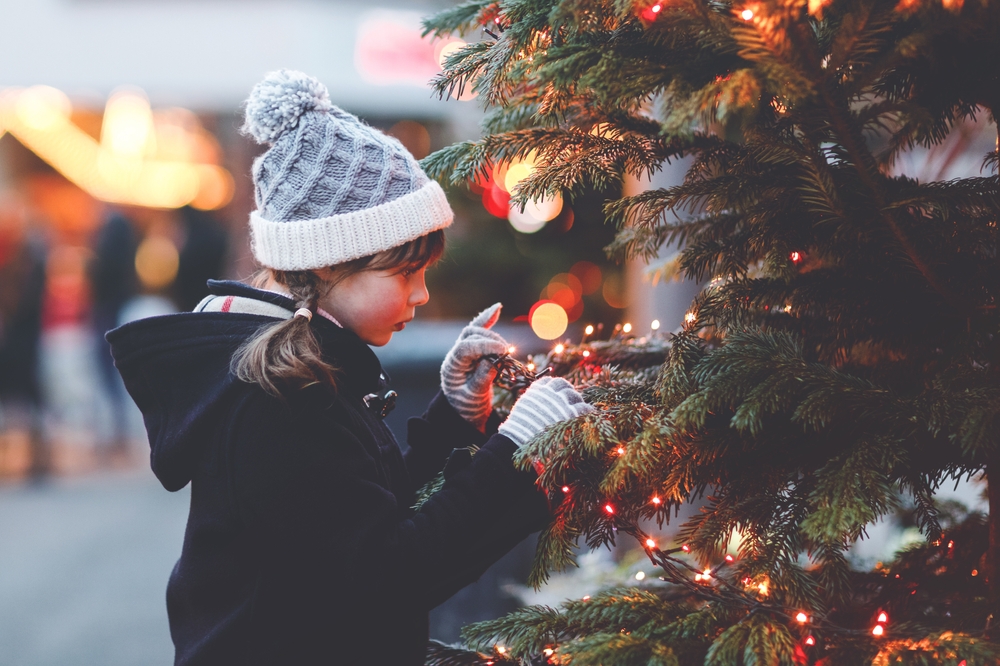 Little,Cute,Kid,Girl,Having,Fun,On,Traditional,Christmas,Market