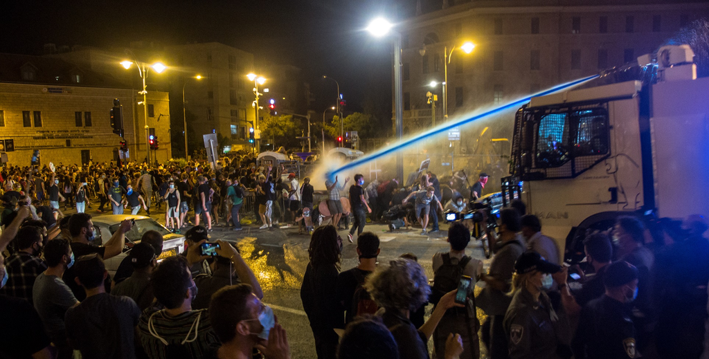 Police water cannon protest
