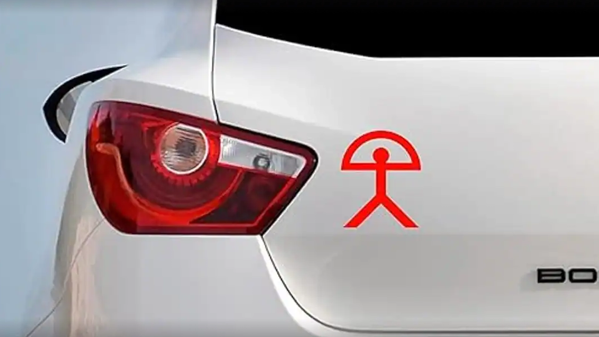 Hva betyr dette symbolet på baksiden av biler?