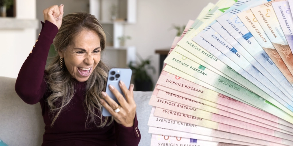 Kvinna jublar över mer pengar