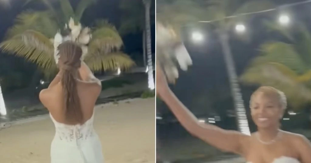 Brud skal til at kaste brudebuket: Så sker der noget, ingen havde forventet