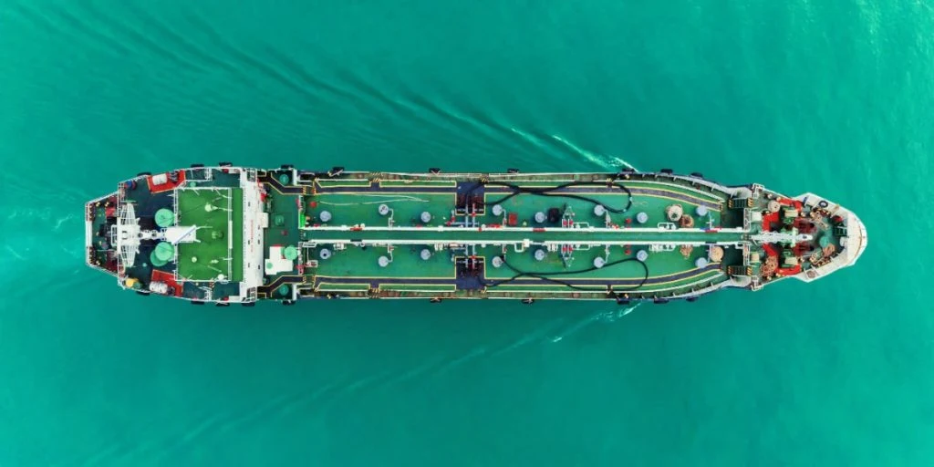 Aerial top view Oil ship tanker transportation crude oil from refinery on the sea
