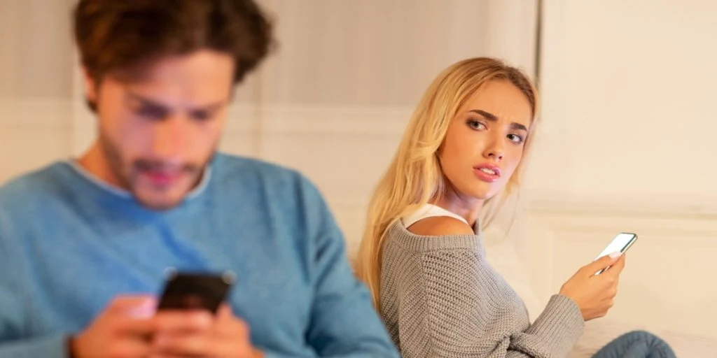 Possible infidelity wife wondering who man is texting social media unfaithful