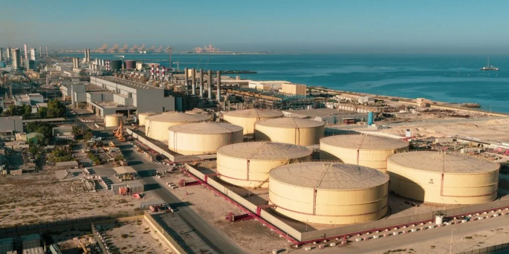 Middle East water and gas containers along the coastline for gas, water and oil concepts. Industrial zone.