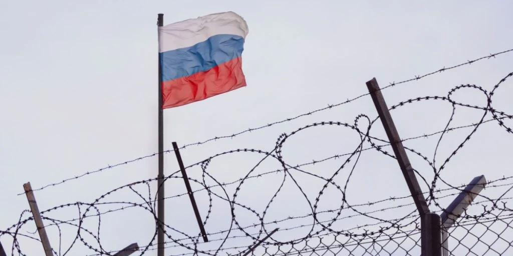 Russia Russian border barbed wire flag