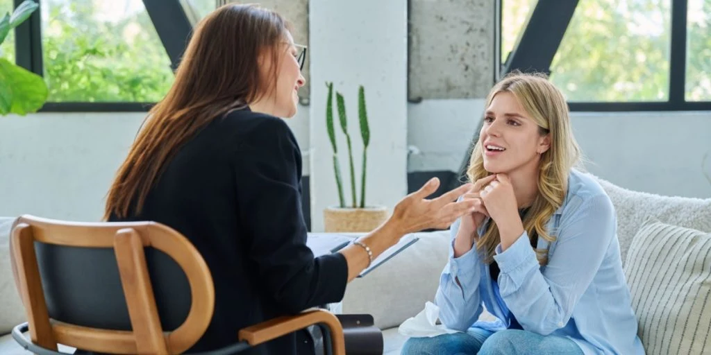 Two women talking listening conversation