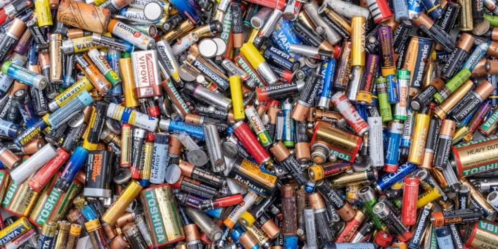 Pile of used batteries