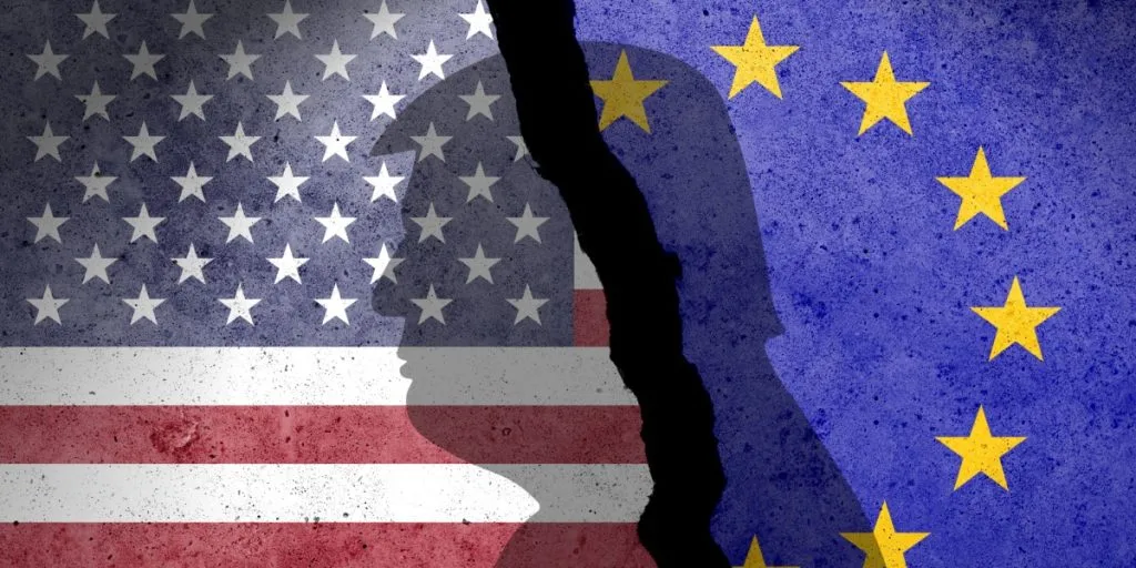 USA and EU flags on a concrete wall. USA and European Union trade, tariffs, duty and customs war. Europ and us relations