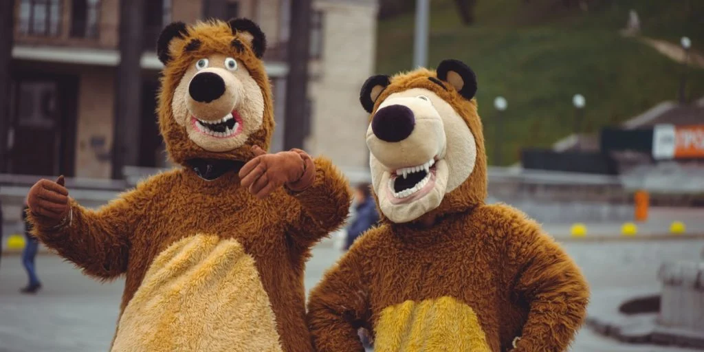 Two persons in bear costume