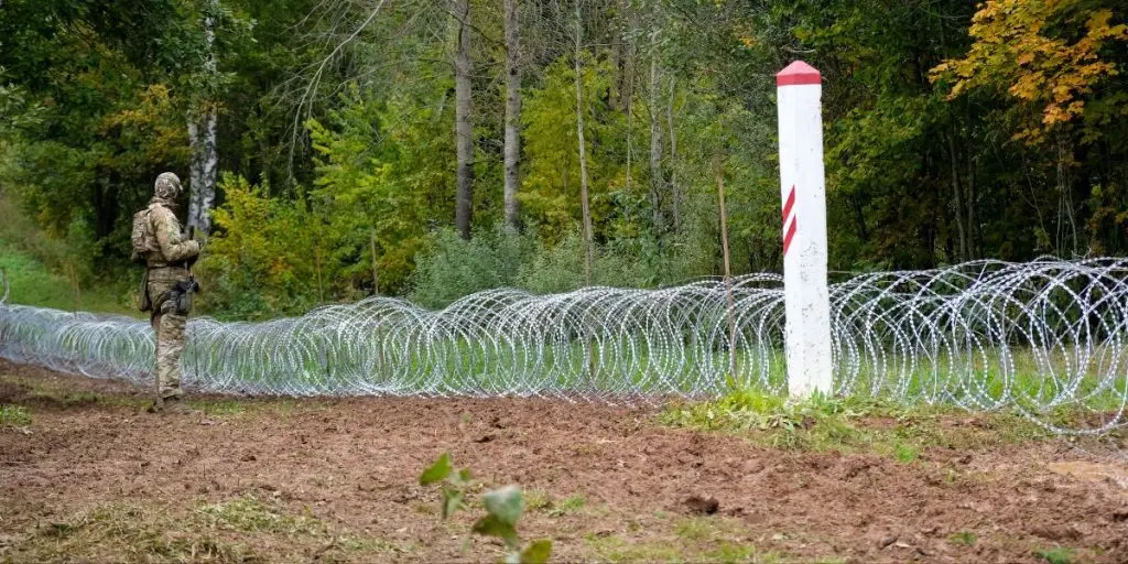 Latvia - Belarus border, where Latvian State Border Guard and army begins to install a barbed wire fence