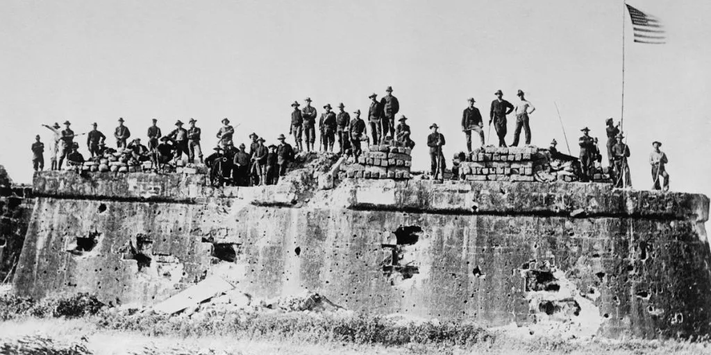 American troops at Fort San Antonio de Abad in Manila after the U.S. flag was raised on August 13, 1898. American and Spanish commanders had agreed beforehand to a limited engagement that would allow Spain to surrender the city to U.S. forces.