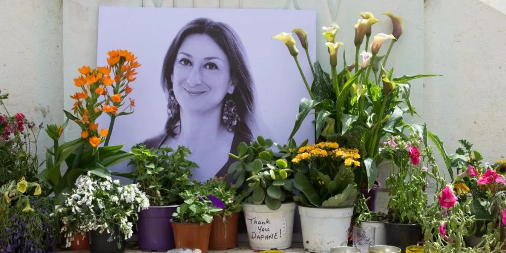 Valletta, Malta - April 3rd 2018: Photographs, candles and messages at the base of the Great Siege Monument demanding justice for the journalist Daphne Caruana Galizia who was murdered in 2017.