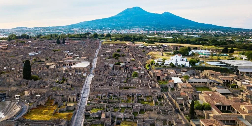 The ruins of Pompeii with Mount Vesuvius in the background. The Roman city was buried during the eruption of AD 79.