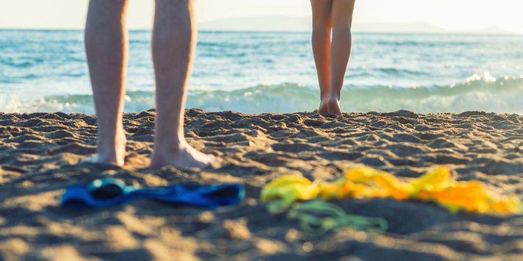 Why does society remain terrified of public nudity despite its psychological benefits?