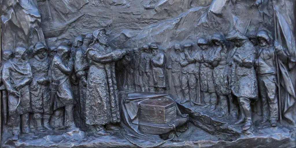 sculpted relief on the base of the statue to Sir John Franklin