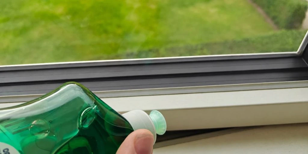 Washing up liquid window frame