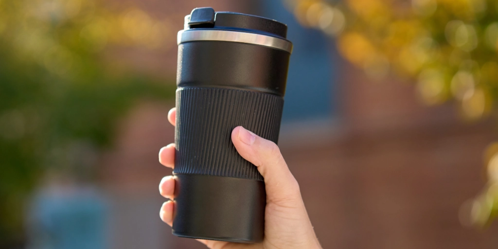 Svart termos kaffemugg