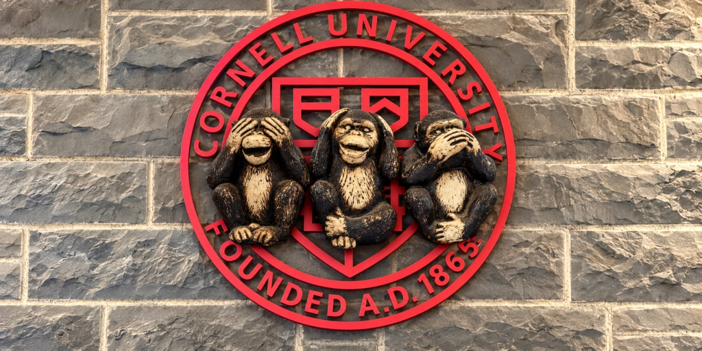Seal of Cornell University featuring the three monkeys who can't see, hear or talk