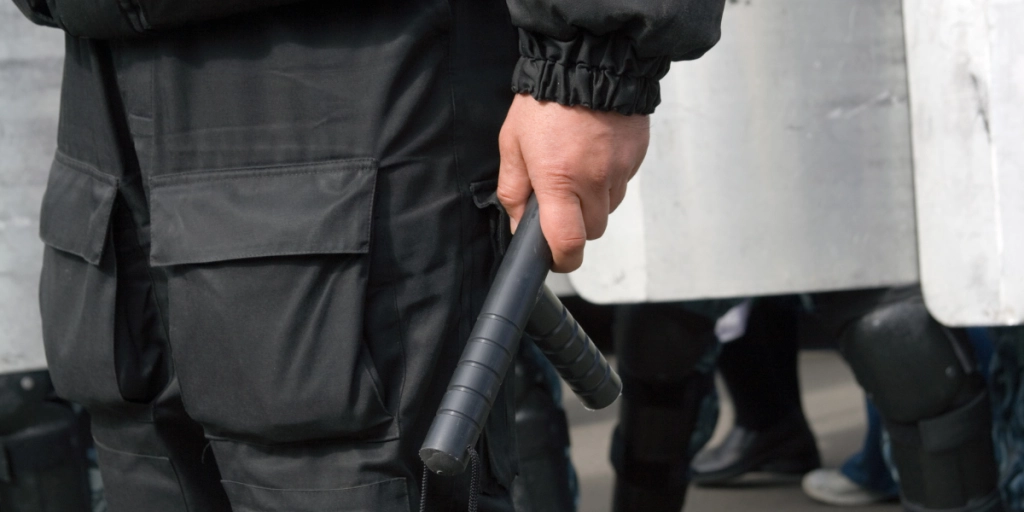 Riot police, baton