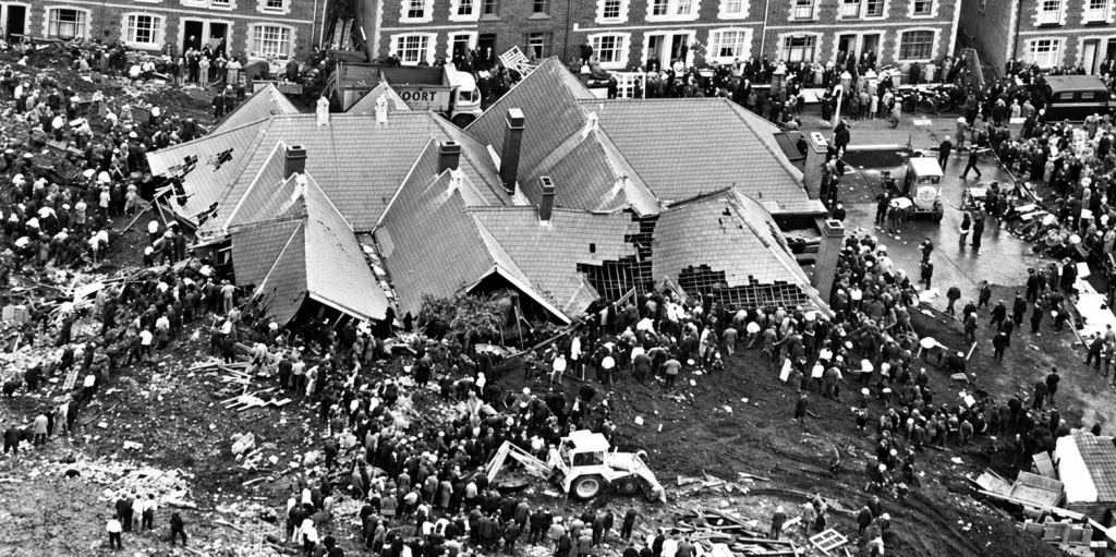 Rescuers searching the remains of the school at the Aberfan disaster