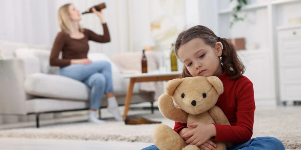 Mommy drinking child sad teddybear